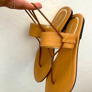 Simple beige sandals. Easy to slip on and off.